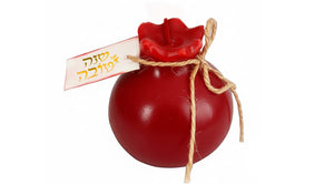 נר רימון אדום לראש השנה – עיצוב שולחן חגיגי ומרשים